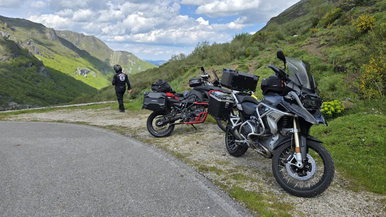 A mountain-road pause with the bikes.