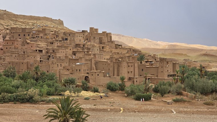 Earthen walls above the green valley.